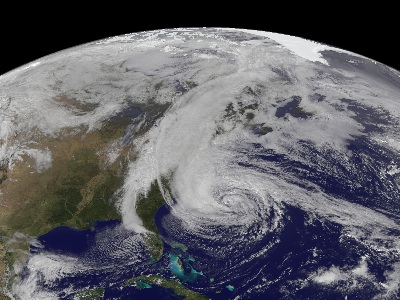 An image of Hurricane Sandy taken by the GOES-13 satellite on October 28.  This category 1 <a href="/earth/Atmosphere/hurricane/hurricane.html&edu=high">hurricane</a> was huge, spanning a horizontal distance of about one-third the US continental landmass.  The storm came onshore in New Jersey, and gradually moved northeast.  The storm disrupted the lives of tens of millions in the eastern US, doing billions of dollars in damage, resulting in over 30 deaths.  Visit the National Hurricane Center's webpage on <a href="http://www.nhc.noaa.gov/">Hurricane Sandy</a> for details.<p><small><em>Image courtesy of NASA</em></small></p>