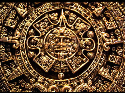 For the Aztecs, who lived in central Mexico, <a href="/mythology/tonatiuh.html&edu=elem&dev=">Tonatiuh</a> was a <a href="/sun/sun.html&edu=elem&dev=">Sun</a> god. Aztecs believed that four suns had been created in four previous ages, and all of them had died at the end of each cosmic era. Tonatiuh was the fifth sun and the present era is still his. The carvings on this sunstone represent the four cycles of creation and destruction in the Aztec creation story. The skull at the center depicts the god Tonatiuh.<p><small><em>   Image courtesy of Corel Corporation.</em></small></p>